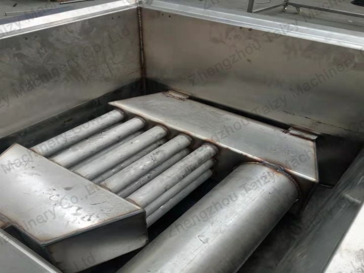 Heating pipes under the fryer